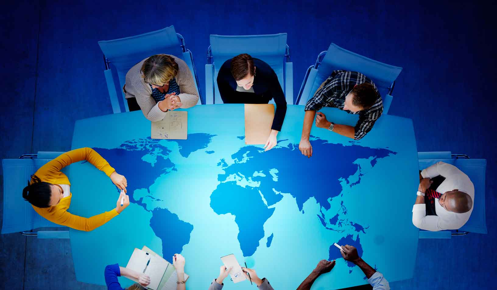 Conference-table-with-world-map-on-table